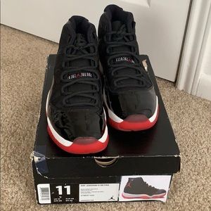 JORDAN 11 RETRO VARSITY RED